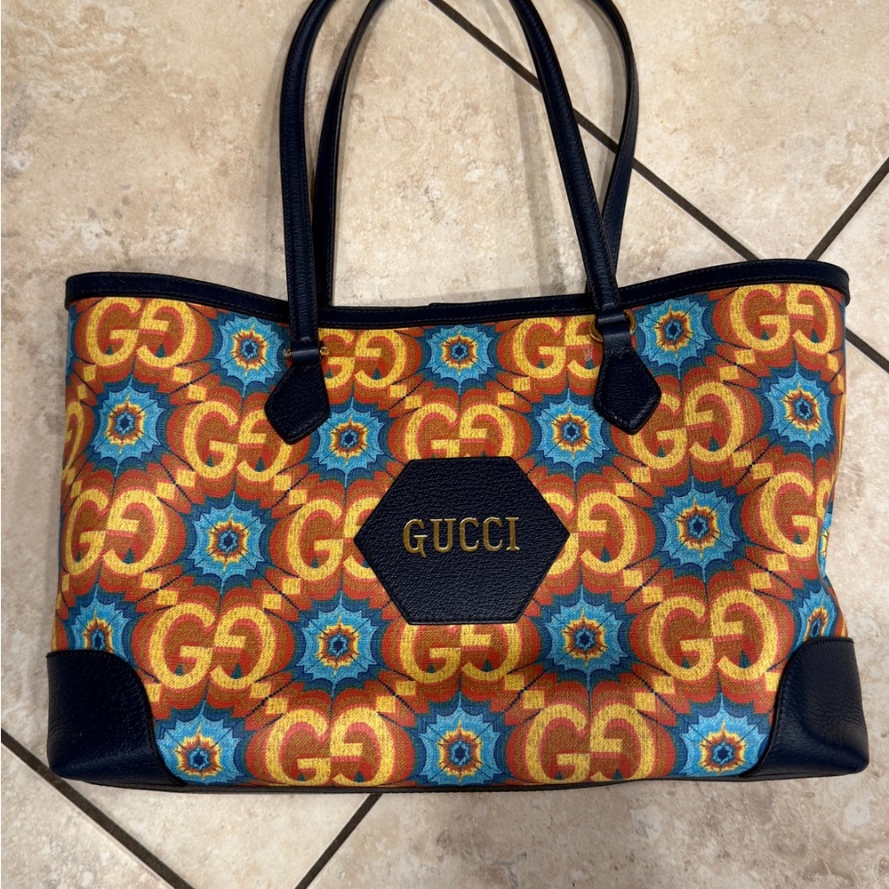 Gucci Centennial Limited Edition Tote in the iconic Kaleidoscope GG pattern.